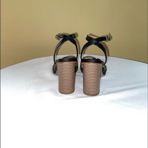 Adorable woman’s black Sandals looks great with skirts, dress, shorts